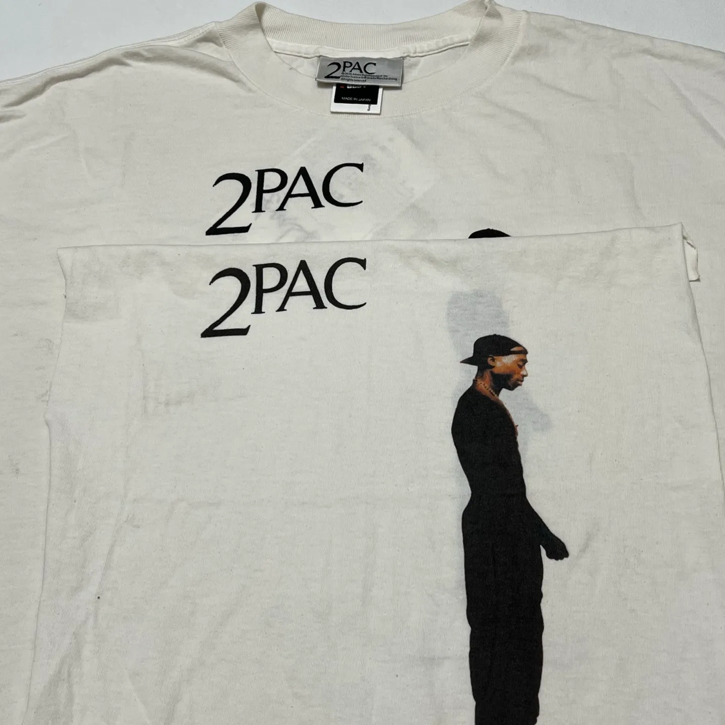 Printing and patterning SAINT Mxxxxxx × PAC 2PC_SS TEE/2PAC/WHT 2PAC co-branded 2PAC rapper TEE off-white S-XL This season's hottest and most important co-branded series is undoubtedly the 2PAC co-branded. The eternal god in the rap industry. 2PAC fans must invest in it. Accessories are in full range. 2PAC co-branded main label/co-branded wash label/SAINT black main label/little angel anti-counterfeiting label
